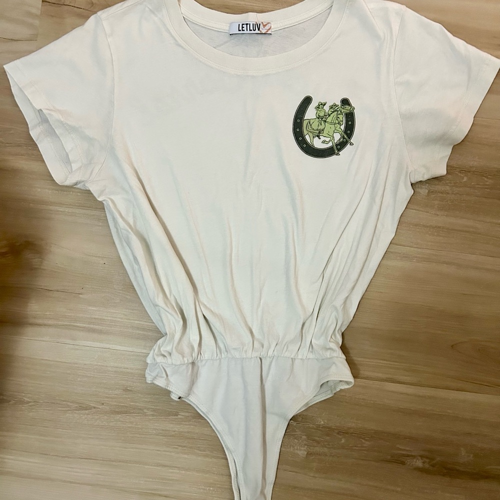 Free People White Bodysuit with Green Horseshoe Design